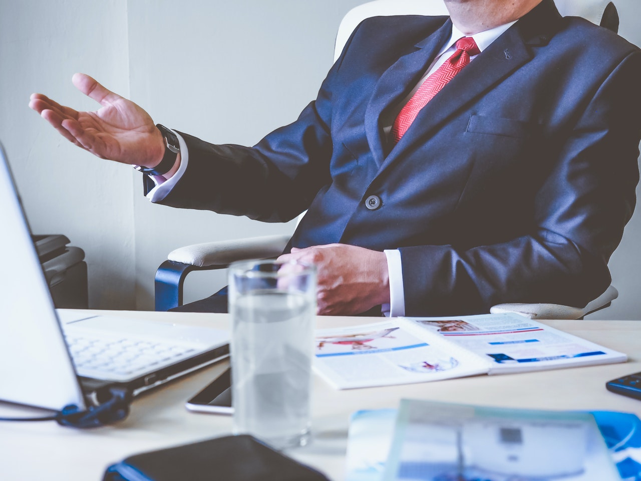 A lawyer consulting with clients in a meeting